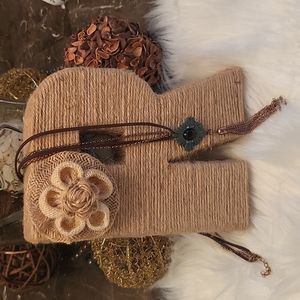 Very nice  leather and metal necklace with metal tassel. Approx 22 inches